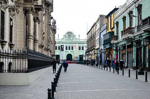 Lima, Peru - September 5, 2014: Typical street in the historical centre of Lima. People can be seen walking around.