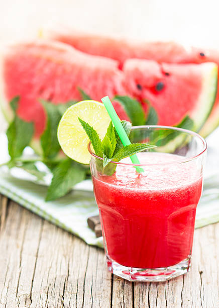 istock Watermelon juice with lime and mint in the glass 523623274