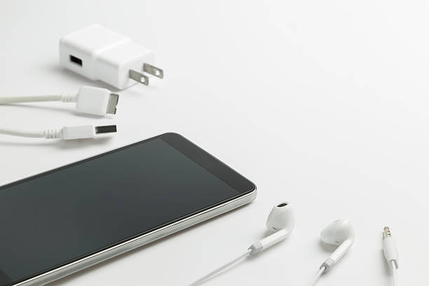 Smartphones with earphones and charger