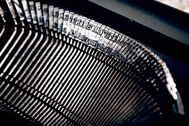 istock closeup of old typewriter letters 523625260