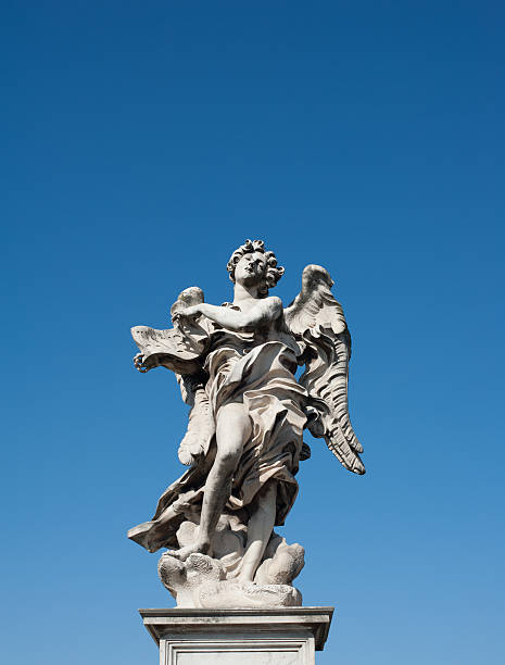 istock Angel old roman statue on blue sky 523625356