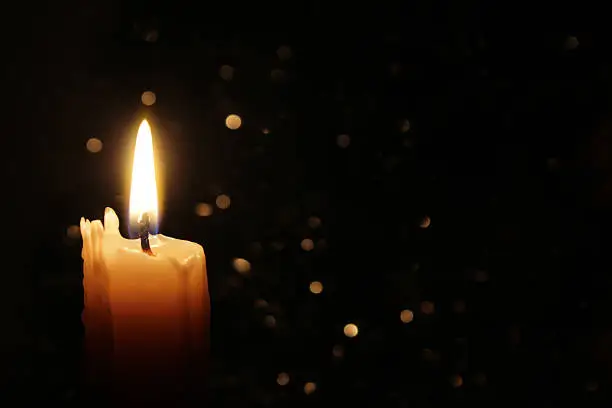 Photo of Candles Burning at Night