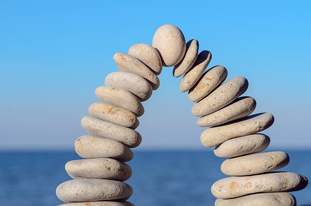 istock Arch of white pebbles 523626490