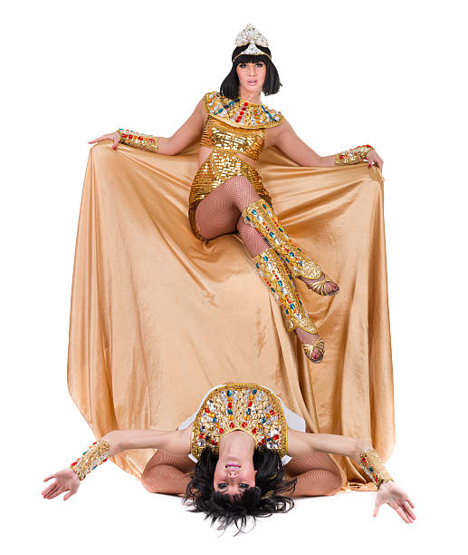 istock Dancing pharaoh women wearing a egyptian costume 523627594