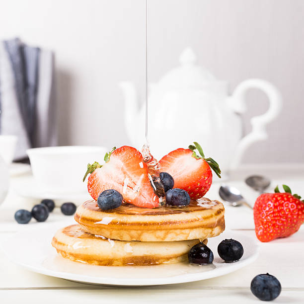 istock Homemade pancakes with berries. 523628864
