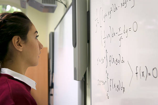 istock Young Woman Doing Math at Secondary School, University inIstanbul, Turkey 523635959
