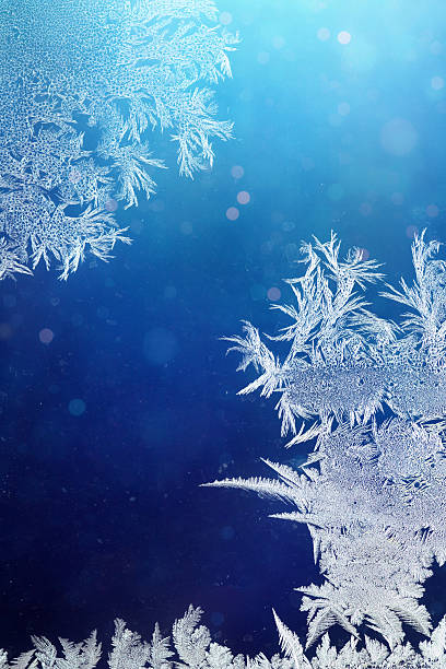 istock Winter night behind frozen window glass 523647767