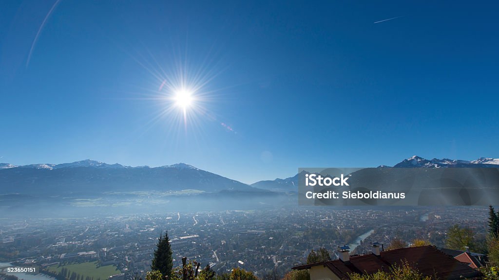 View over Innsbruck on a bright, sunny November day. Blue Stock Photo