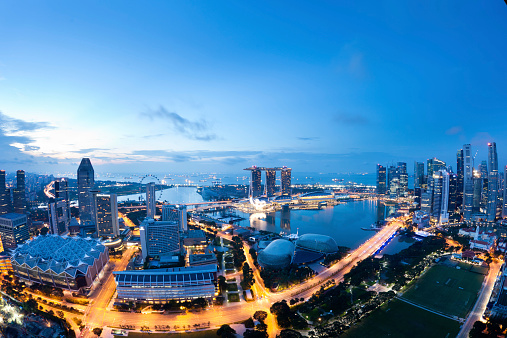 Aerial view of Singapore at sunrise. Shot taken with fisheye lens.