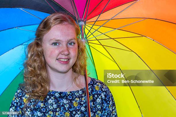Teenage Girl Under Colored Umbrella Stock Photo - Download Image Now - Adolescence, Adult, Beautiful People