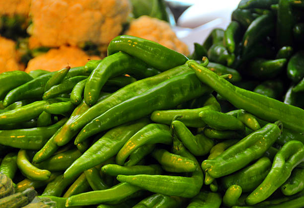 Béjaïa / Bougie, Kabylia, Algeria: pile of long green peppers at the market 