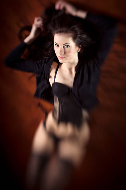 istock Sensual women posing in black lingerie 523660221
