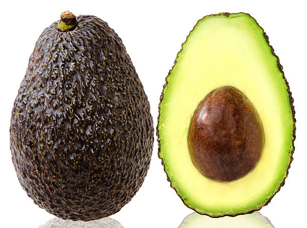 Avocados on a white background Avocados on a white background hass avocado stock pictures, royalty-free photos & images