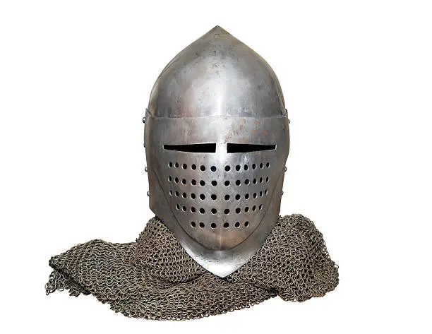 old knight helmet and chain mail for protection in battle. is made of metal. of knightly armor