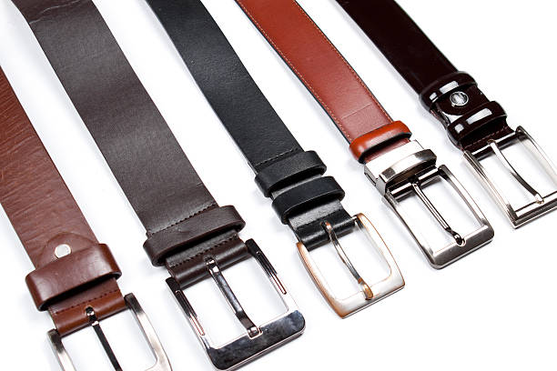 istock Men black belts isolated on white. 523662593