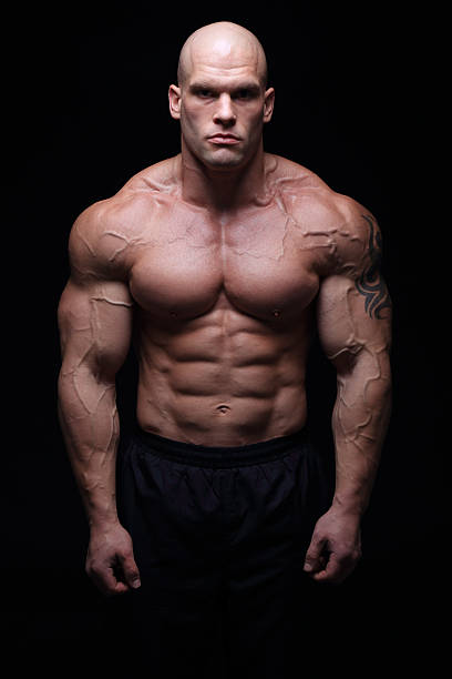 bodybuilder posando - abdominal muscle extreme sports sensuality sex symbol - fotografias e filmes do acervo