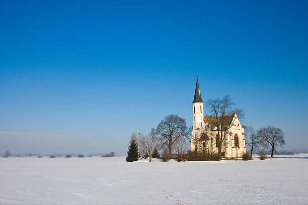 istock Winter landscape with a church 523673717