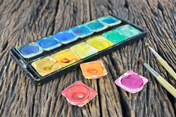 istock Water color paint box and paint brush 523676327