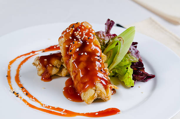 Close up Saucy Crispy Chicken with Sesame Seeds
