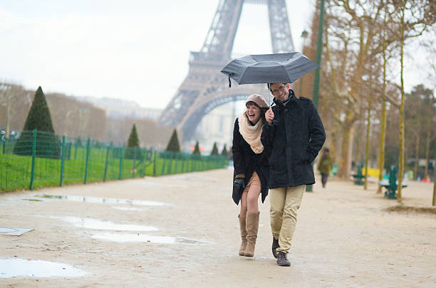 istock Romantic couple under the rain in Paris 523679719