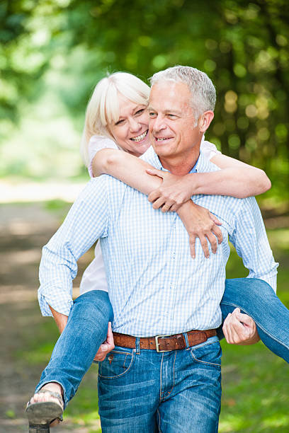 istock Mature Couple Having Fun Outdoors 523680369