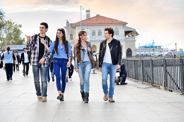 Young friends walking near Galata Bridge.