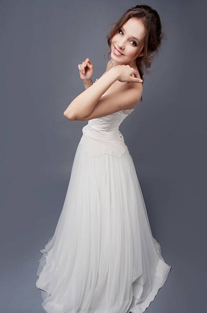 istock Happy  bride wearing white wedding lace dress 523688140