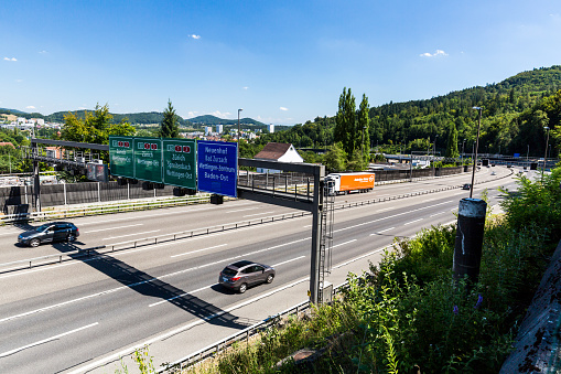 Wettingen, Switzerland - July 21, 2015: Views of the motorway A1 near the Baregg Tunnel and the cities of Baden, Neuenhof and Wettingen on July 21, 2015. The motorway A1 ist the oldest in Switzerland.