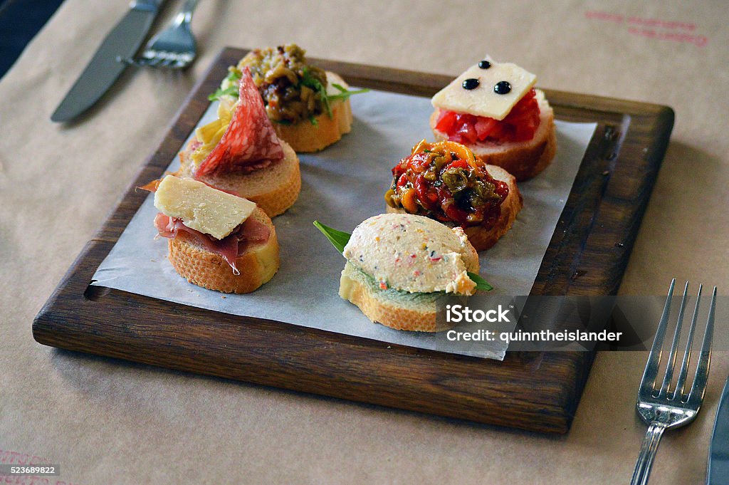 Six Different Types of Bruschetta Six different types of bruschetta at a restaurant in Moscow, Russia Appetizer Stock Photo