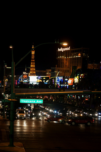 Las Vegas, USA - December 23, 2015: Traffic on Las Vegas Boulevard corner Tropicana Avenue with a collection of casinos and luxury hotels in the night of December 23, 2015 in Las Vegas.
