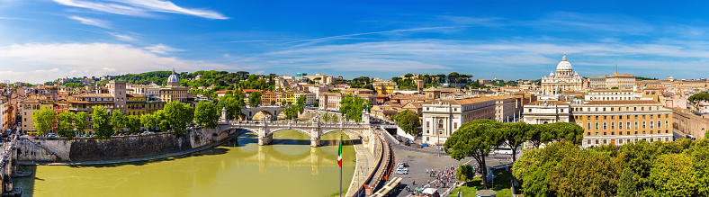 View of the Tiber river and the St. Peter Basilica in Rome - Italy