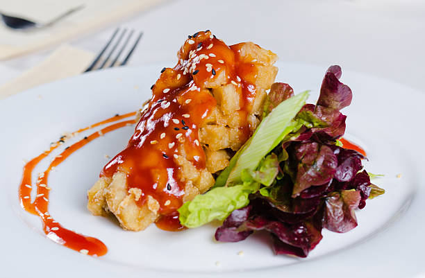 istock Crispy Fried Chicken with Sauce and Veggies 523692251