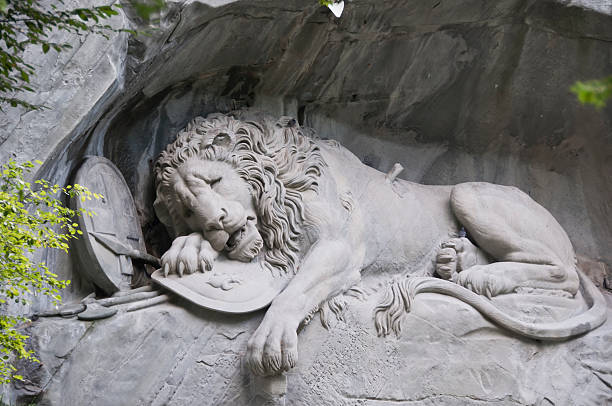 istock Dying lion monument in Lucerne, Switzerland 523692331
