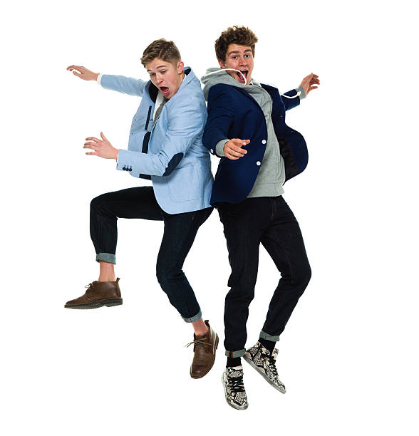 istock Cheerful brothers jumping 523692734