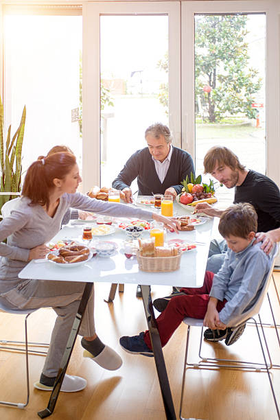 istock family eating breakfast 523693121
