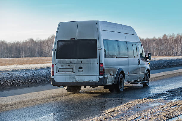 istock minibus goes on winter highway 523693502