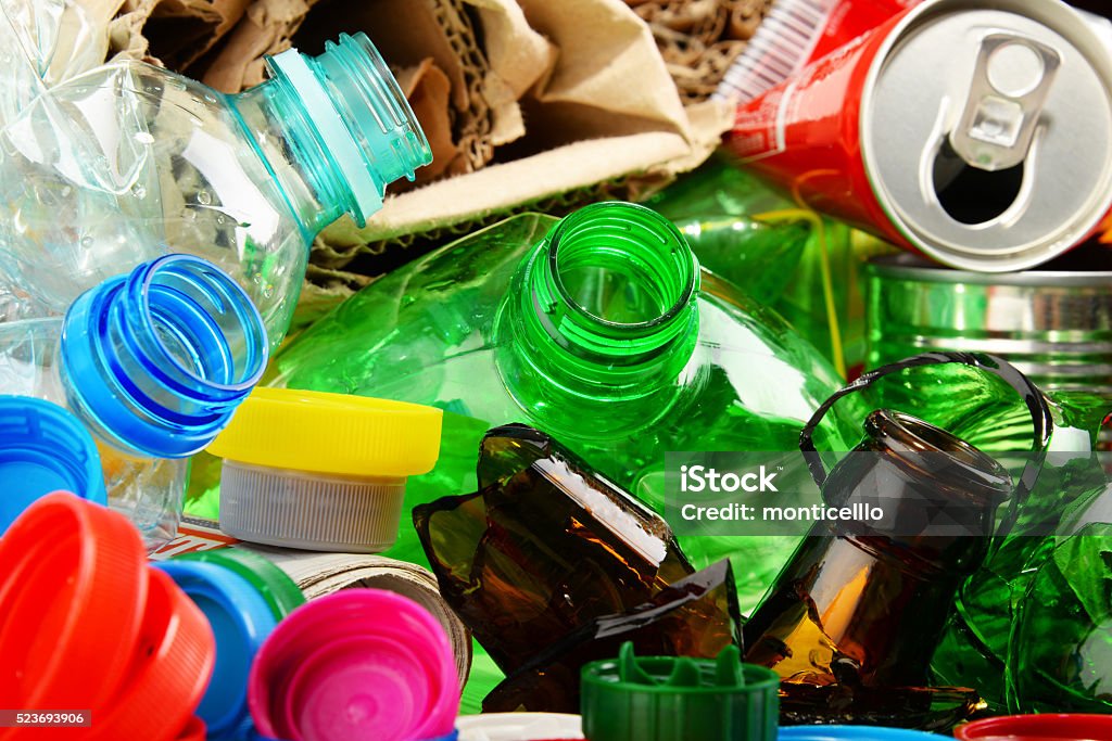 Recyclable garbage consisting of glass, plastic, metal and paper Recyclable garbage consisting of glass, plastic, metal and paper. Bottle Stock Photo