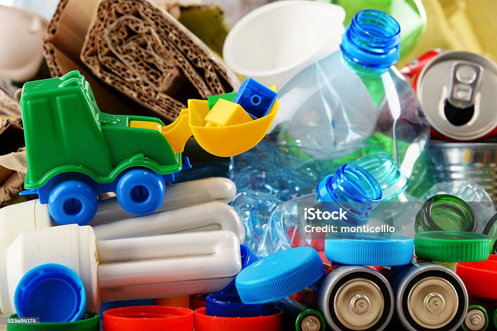 Recyclable garbage consisting of glass, plastic, metal and paper Recyclable garbage consisting of glass, plastic, metal and paper. Plastic Stock Photo