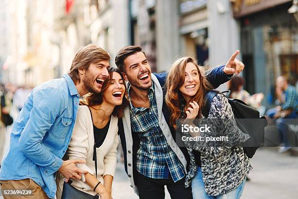 Happy Friends Smiling On The Street Stock Photo - Download Image Now - Showing, Street, 30-34 Years