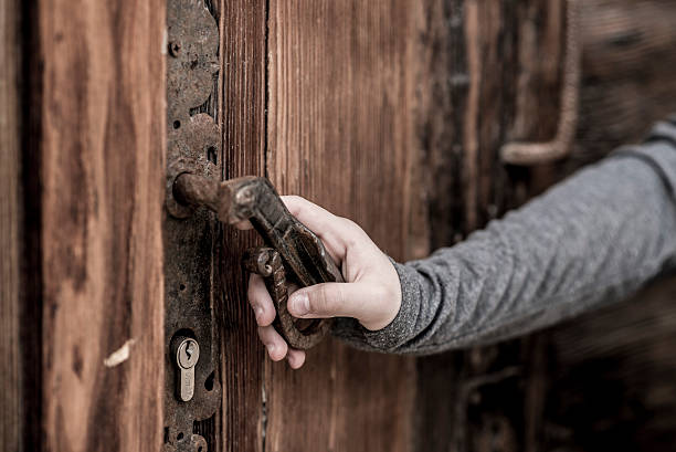 istock Hand opening the door 523694978