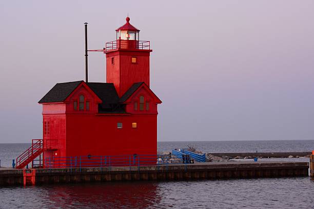 istock Red Lighthouse in Holland MI at Dawn 523695576