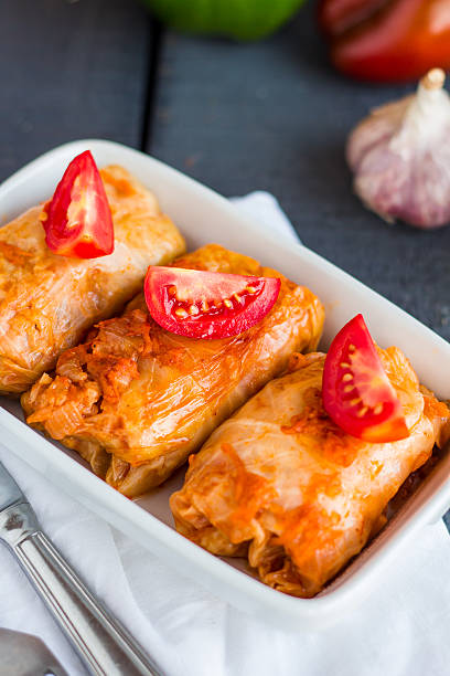 istock stewed stuffed cabbage with meat and tomatoes, Russian cuisine 523696227