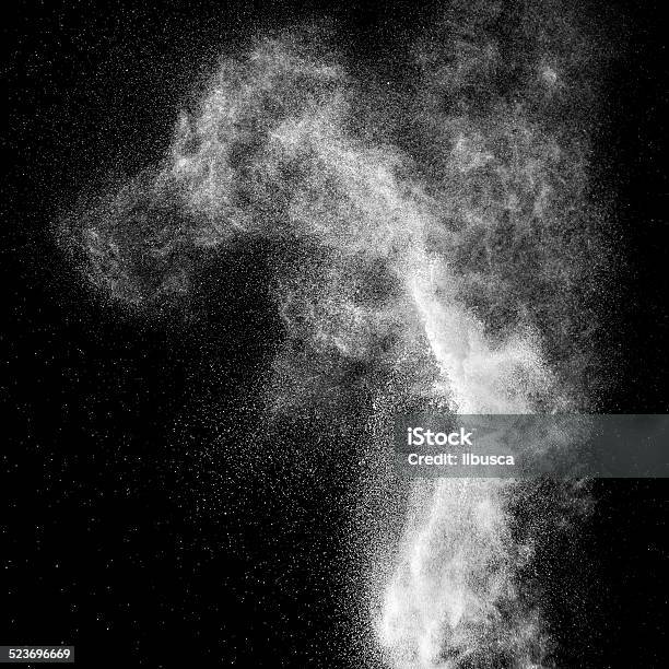 Flour Explosion On Black Background Stock Photo - Download Image Now - Dust, Black Background, Exploding