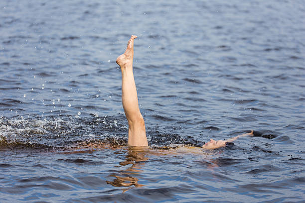 istock woman in blue water lake 523698328