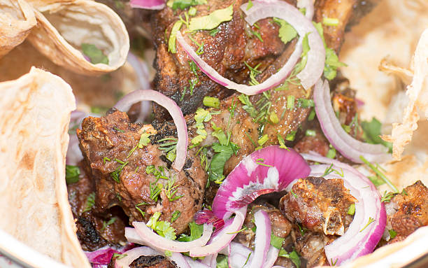 istock Grilling shashlik on barbecue grill. 523701368