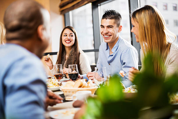 istock People on a lunch in restaurant. 523706559