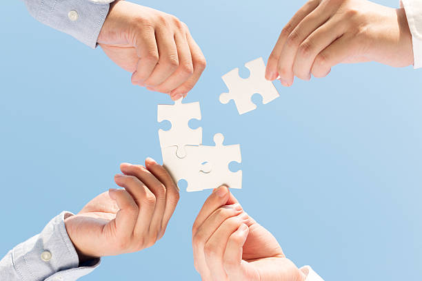 istock puzzle jigsaw and concept with sky background 523709891