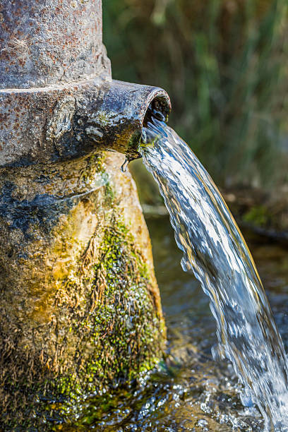 istock Spout of an old water pump 523711341