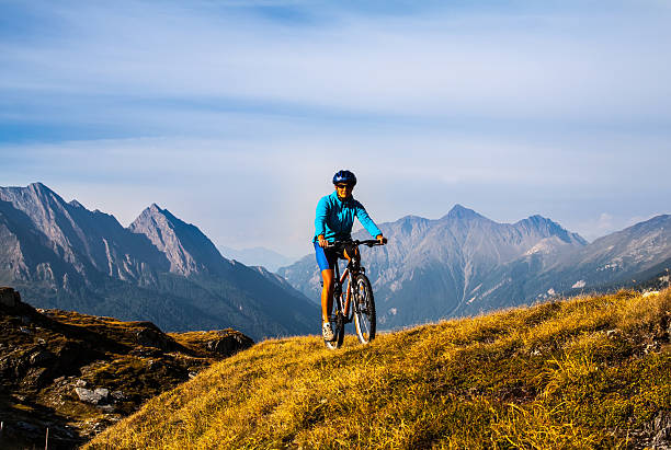 istock Cyclist woman in hight mountais 523720689