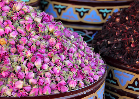 Morocco, Marrakesh, dried rosebuds in one of the Medina's many souks. UNESCO World Heritage site. Shallow / selective focus.